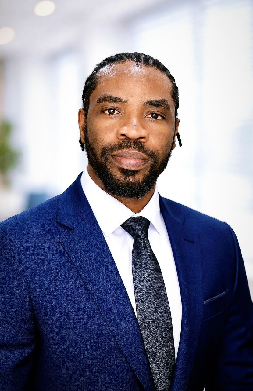 Malik Olawale — CEO & Managing Director